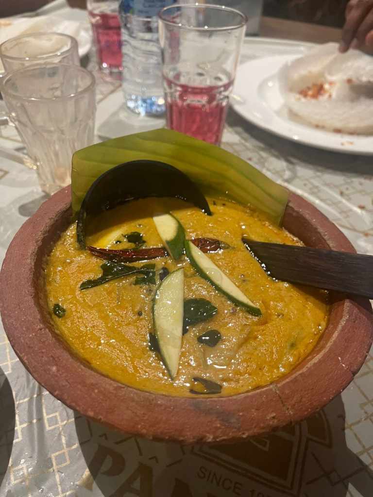 panoor coconut mango curry qatar